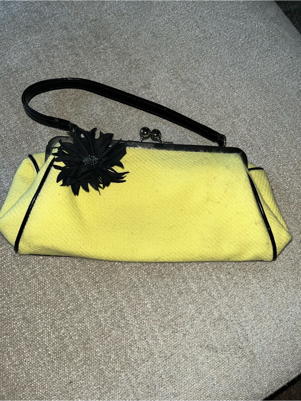 Yellow Wristlet Clutch with Black Trim and Flower Accent